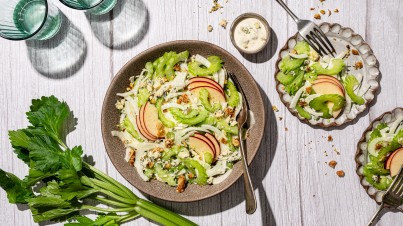 Celery, fennel and red apple salad with a creamy blue cheese dressing and walnuts