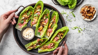 Crunchy Cos lettuce cups filled with stir-fried mushrooms and pickled pink ginger