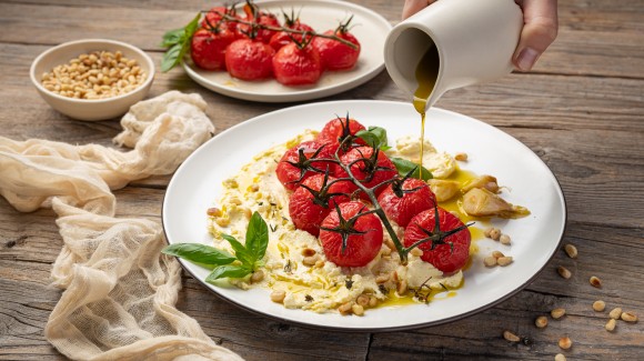 Slow-cooked naked tomatoes on whipped feta